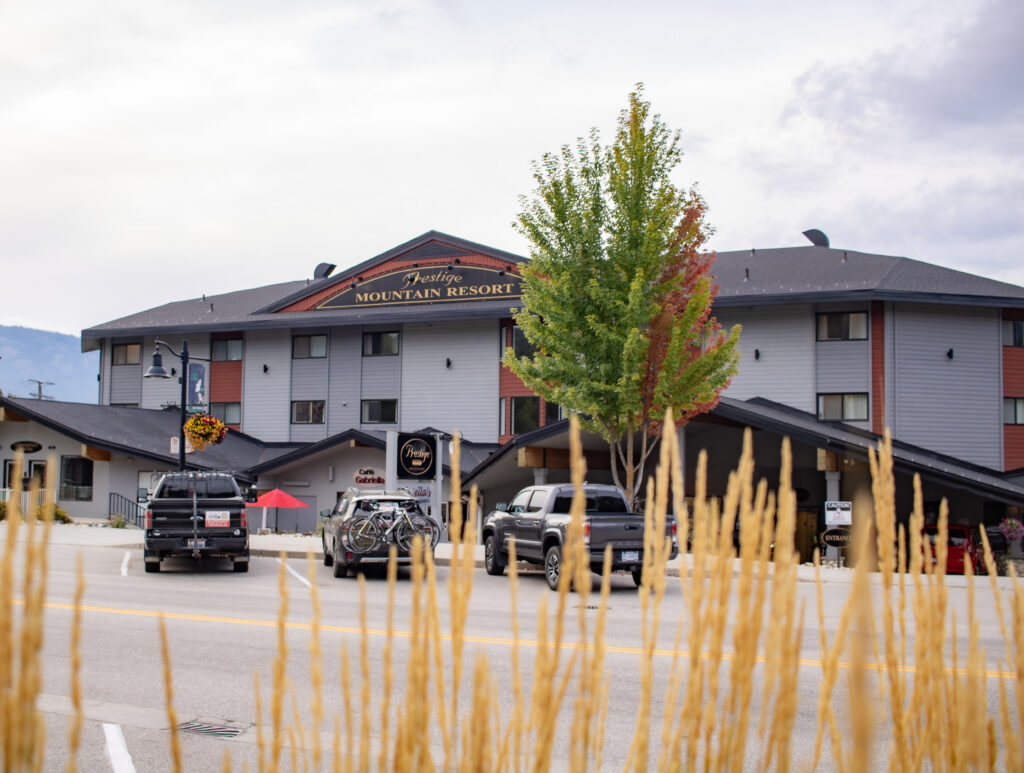 Exterior view of Prestige Mountain Resort Rossland, located on Columbia Avenue near art walk sites.